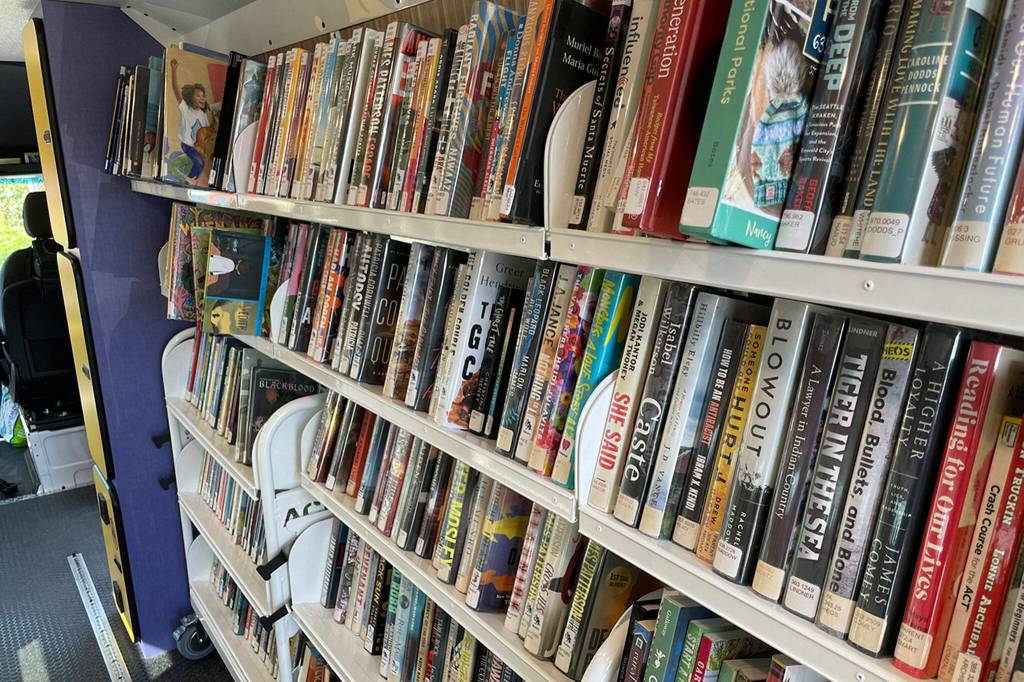 Sequim Gazette photo by Matthew Nash/ The NOLS Bookmobile offers space for about 1,000 items for people to check out when it stops in their area.