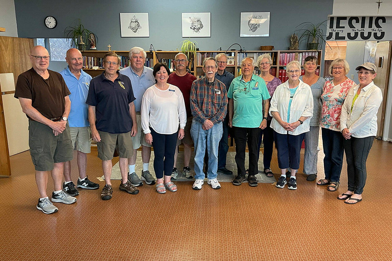 Sequim Gazette photo by Matthew Nash
A majority of the volunteers with the Society of St. Vincent de Paul at the St. Joseph Conference in Sequim gather before their first June meeting on June 12. Organizers say theyve seen a jump in emergency need for rent, utilities, and other necessities.