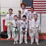 Photo courtesy of Larry Muckley
Next Level Taekwondo athletes celebrate strong finishes at a tournament in Battle Ground in May. Pictured are (back row, from left) Wyatt Estep, Jobe Kirner and Mia Kirner, with Maverick Muckley, Gunner Muckley and Atticus Reed.