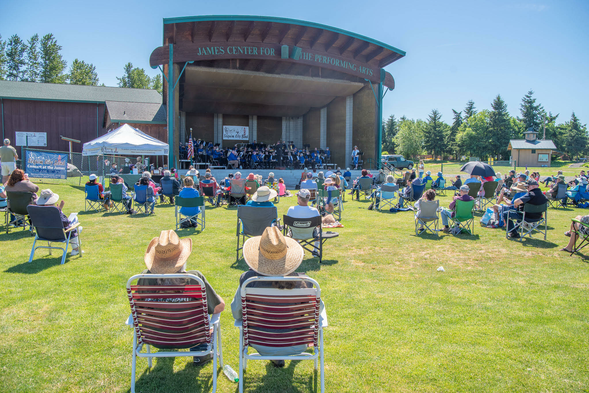 Sequim Gazette photo by Emily Matthiessen / Music fans enjoy a sunny spring day and a free concert as the Sequim City Band entertains with Building a Legacy. The event at The James Center for Performing Arts included a ribbon-cutting and tours of the bands expanded rehearsal space.