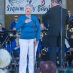 Sequim Gazette photo by Emily Matthiessen / Vicki Kirchner belts out The Star Spangled Banner to a responsive crowd at the June 11 concert celebrating the expansion of the James Center for Performing Arts.