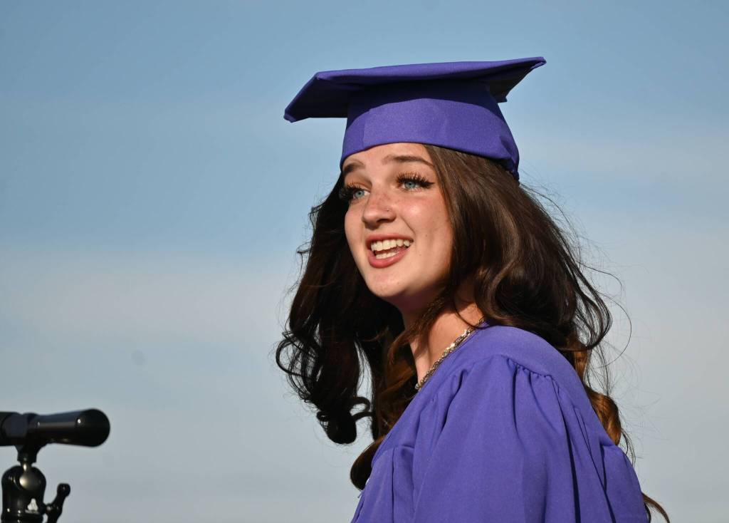 Class-elected speaker Rae Douglas offers her speech at Fridays Sequim High School graduation ceremony.
