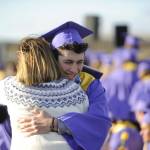 Sequim Gazette photoS by Michael Dashiell 
Graduating senior Ayden Humphries gets a hug from school board member Patrice Johnston at the Sequim High School commencement ceremony on June 16.