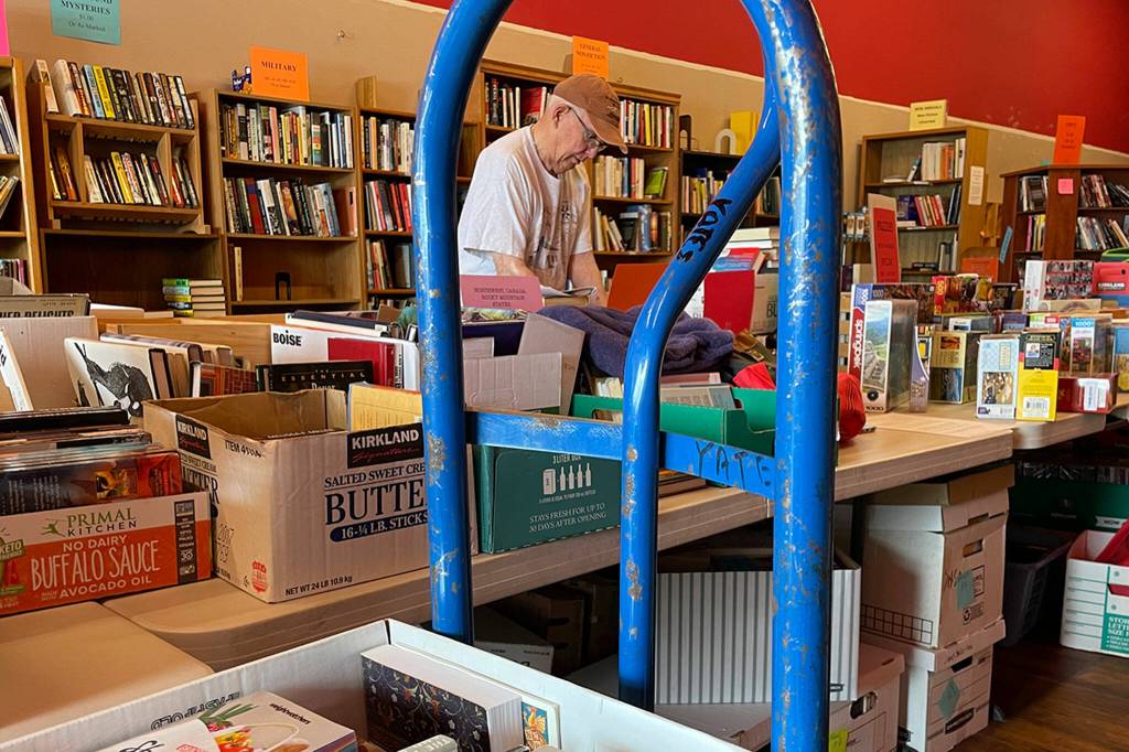 Sequim Gazette photo by Matthew Nash
Volunteer Roger Uhden has volunteered for six years with Friends of Sequim Library and attributes its late president Liz Phelps to getting him started. He asked her at a monthly book sale, How can I see these before anyone else? Volunteer, she said.