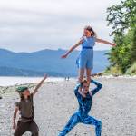 Sequim Gazette photo by Emily Matthiessen / At the Port Williams beach in Sequim, Rivers Maynard as Peter Pan, Keylee Disinski as a mermaid, and Rosie Sly-Hobson as Wendy, posed as some of their roles in the upcoming Neverland, which Sequim Acrobatics will be performing at Sequim High School Auditorium this Friday and Saturday.