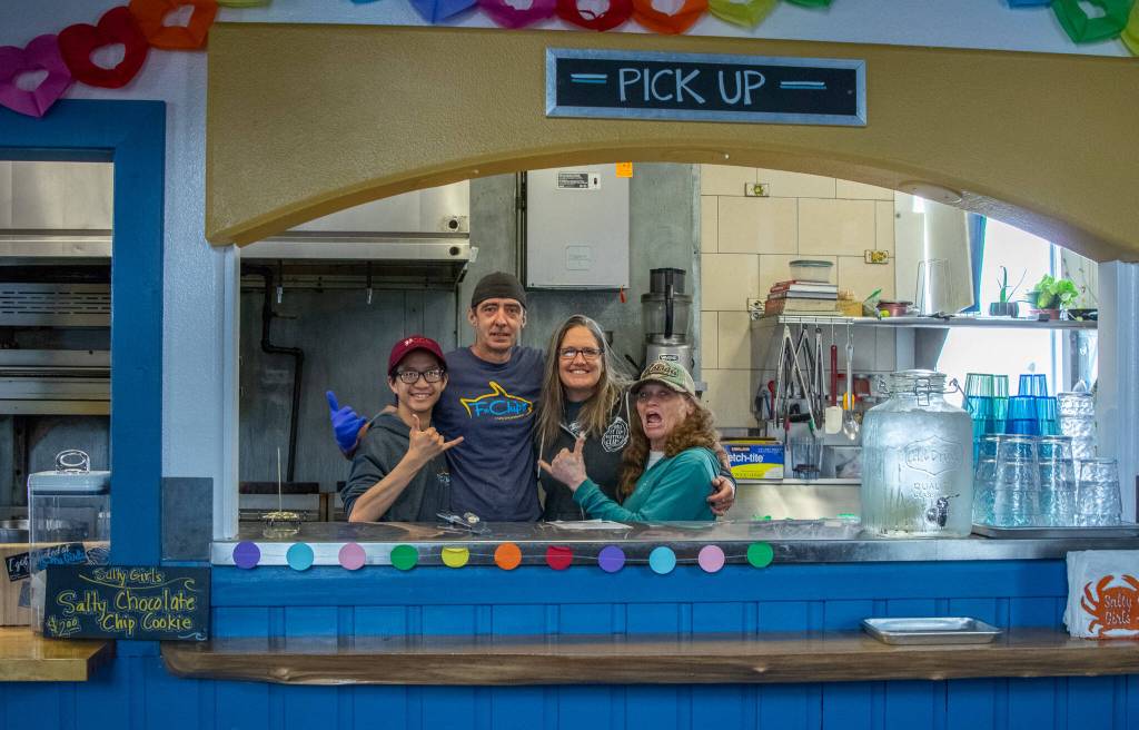Sequim Gazette photo by Emily Matthiessen / From left, Ethan Cesena, Shawn Royaltey, manager, and Tracie Millett and Lavon Gomes, owners, join forces in the kitchen of FnChips, a Salty Girls Production. The owners say that Royaltie is an amazing human, fabulous to work with, a good communicator who is kind, fair, generous and responsible.