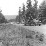 Photo courtesy of the Sequim Prairie Garden Club
The pioneer log cabin now at Pioneer Memorial Park is transported from Chicken Coop Road on July 19, 1966.