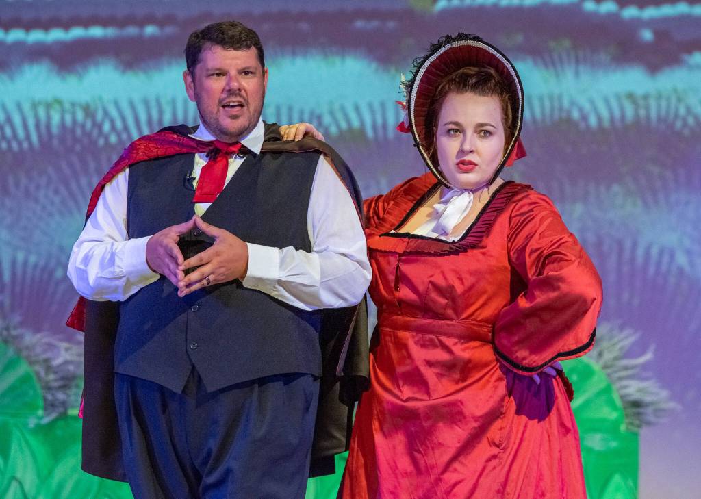 Sequim Gazette photo by Emily Matthiessen / Kyle Bartholick plays a villianous mayor with a deep, classic and wicked laugh in Lavender Lawlessness, Olympic Theatres upcoming high-energy melodrama, written and directed by OTAs David Herbelin. Beside him, the spirited Lady in Red, Little Lottie, is played by Bailey Loveless. Performances are at 7 p.m. on Thursdays, Fridays and Saturdays and at 2 p.m. on Sundays, July 7-23, at the OTA Main Stage, 414 N.S Sequim Ave.