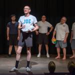 Sequim Gazette photo by Emily Matthiessen / Matt Gieseke stars as Joe in the olio act The Boyz in das Boat, which is the opening act for Lavender Lawlessness, both written and directed by OTA director David Herbelin. Behind him, from left to right are Bill Stone, Phillip McIntyre, Stephan Willms, Joel Hoffman, Mike Carpenter and Peter Griffin.