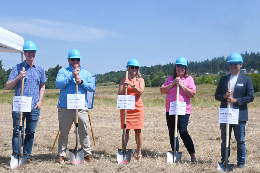 Sequim Gazette photo by Michael Dashiell / Dignitaries help break ceremonial ground on the Brownfield Road Project on July 5, Pictured, from left, are: U.S. Rep. Derek Kilmer; First Fed CEO Matt Deines; First Fed First Fed Community Foundation board member Dawnya Scarano; Colleen Robinson, CEO of Habitat for Humanity of Clallam County, and Mark Hodgson, Habitat for Humanity of Clallam County boards vice president.