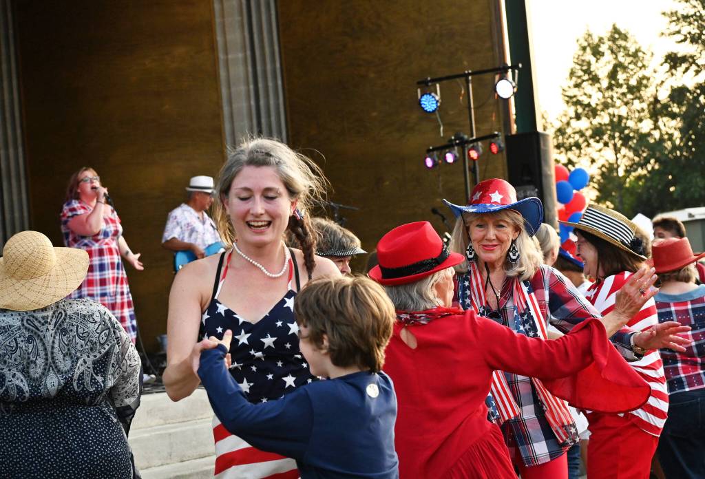 Sequim Gazette photo by Michael Dashiell / Black Diamond Junction gets the crowd dancingat the Sequim Independence Day party on July 4 at Carrie Blake Community Park.