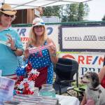 Sequim Gazette photo by Emily Matthiessen / KSQM Administrative Director Tama Bankston, Vicki Shamp, Breezy Dawson and Beverly Dawson sell raffle tickets at the KSQM booth.