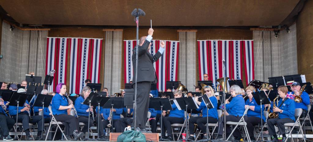 Sequim Gazette photo by Emily Matthiessen
Tyler Benedict leads the Sequim City Band at last weeks Independence Day celebration.