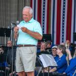 Sequim Gazette photo by Emily Matthiessen / Mayor Tom Ferrell entertains the Sequim City Band with a series of jokes opening his Independence Day speech.