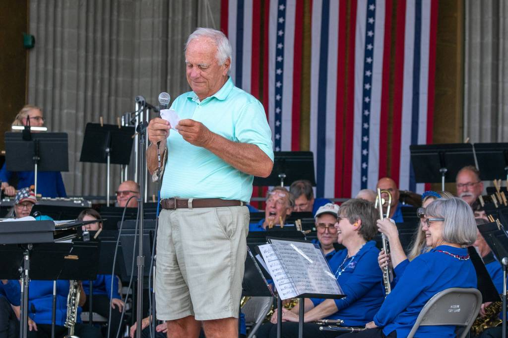 Sequim Gazette photo by Emily Matthiessen / Mayor Tom Ferrell entertains the Sequim City Band with a series of jokes opening his Independence Day speech.