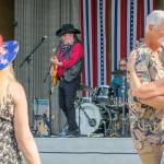 Sequim Gazette photo by Emily Matthiessen / The Buck Ellard Band draws dancers from the crowd during the Independence Day celebration.