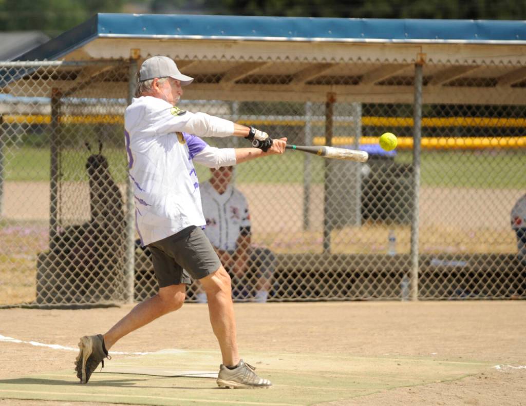 Sequim Gazette photo by Michael Dashiell / Sequim Greywolves Randy Smith looks for a base hit in a July 8 match-up with the Victoria Raiders.