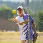 Joel Hecht of the Sequim Greywolves lobs a pitch in an international friendly game with the Victoria Raiders on July 8.