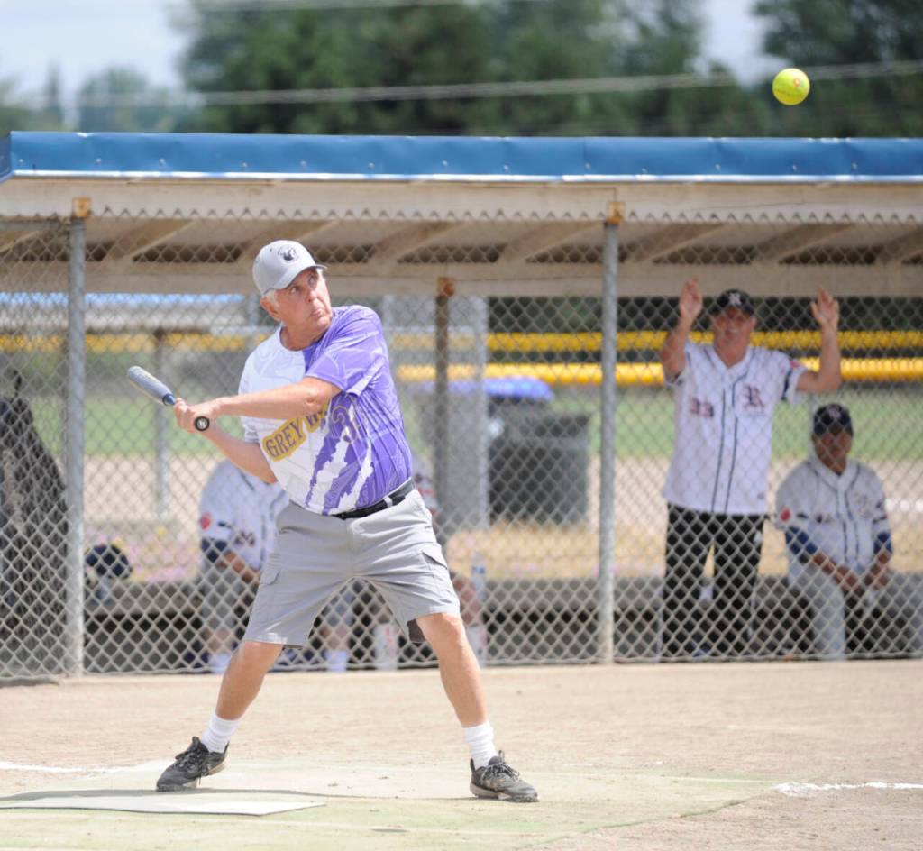 Sequim Gazette photo by Michael Dashiell / Sequim Greywolves Norm Forney looks for a base hit in a July 8 match-up with the Victoria Raiders.