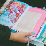 Photo courtesy of Sequim Farmers & Artisans Market / A closer look at a beautiful Alice in Wonderland-themed scrapbook by Frippery by Rose Rose Crawford . This was repurposed from a childrens book.