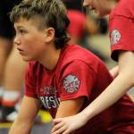 Sequim Gazette photo by Michael Dashiell / Participants in a wrestling camp in Sequim last week don T-shirts that honor former Sequim High coach Chad Cate.