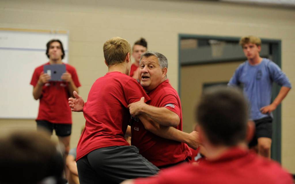 Sequim Gazette photo by Michael Dashiell
Former NCAA wrestling champ Gene Mills offers instruction at a multi-day camp at Sequim Middle School on July 6.