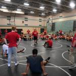Sequim Gazette photo by Michael Dashiell / Former NCAA wrestling champ Gene Mills leads a wrestling camp at Sequim Middle School last week.