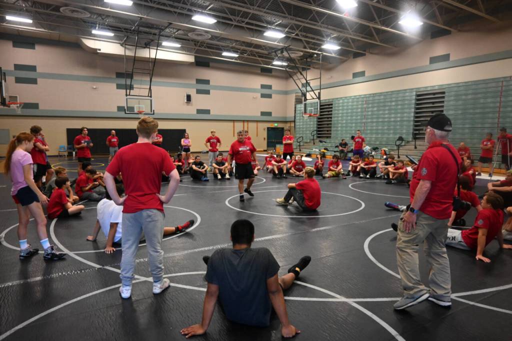 Sequim Gazette photo by Michael Dashiell / Former NCAA wrestling champ Gene Mills leads a wrestling camp at Sequim Middle School last week.