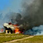 Photo by Marty Bluewater
A Protection Island structure is engulfed in flames in a July 5 wildfire that burned 15 acres on the federally-protected property.