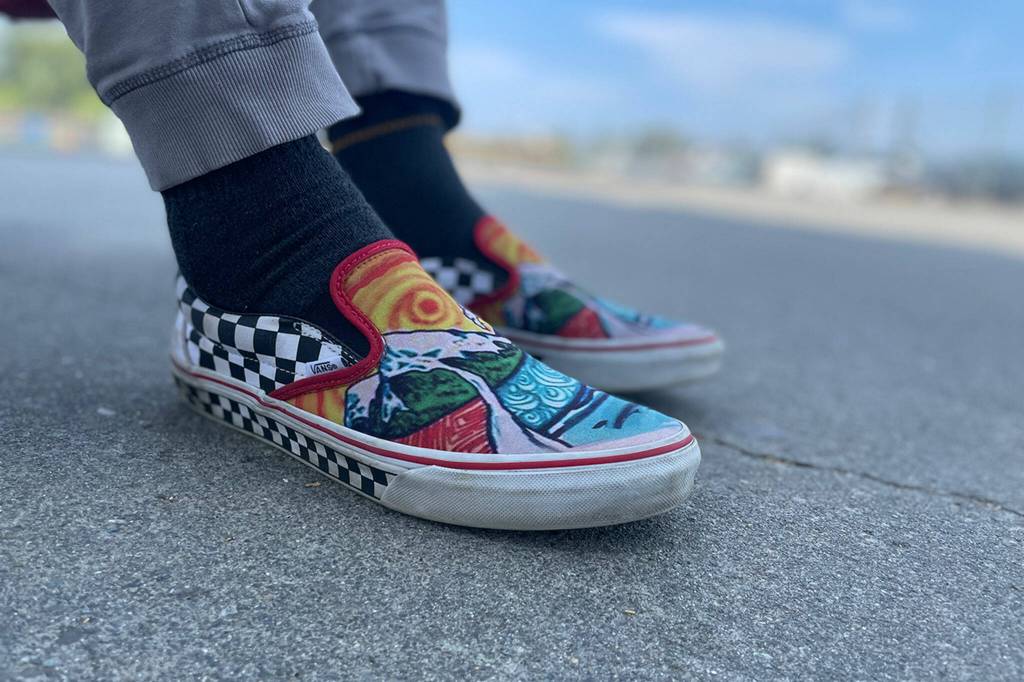 Sequim Gazette photo by Matthew Nash
Shoes synonymous with skating, Mark Simpson said he has at least 31 pairs of Vans shoes, including this pair he designed himself. He plans to post a picture a day of his different shoes in hopes to raise funds through the company for the Sequim Youth Skate Parks efforts to remodel the Sequim Skate Park.