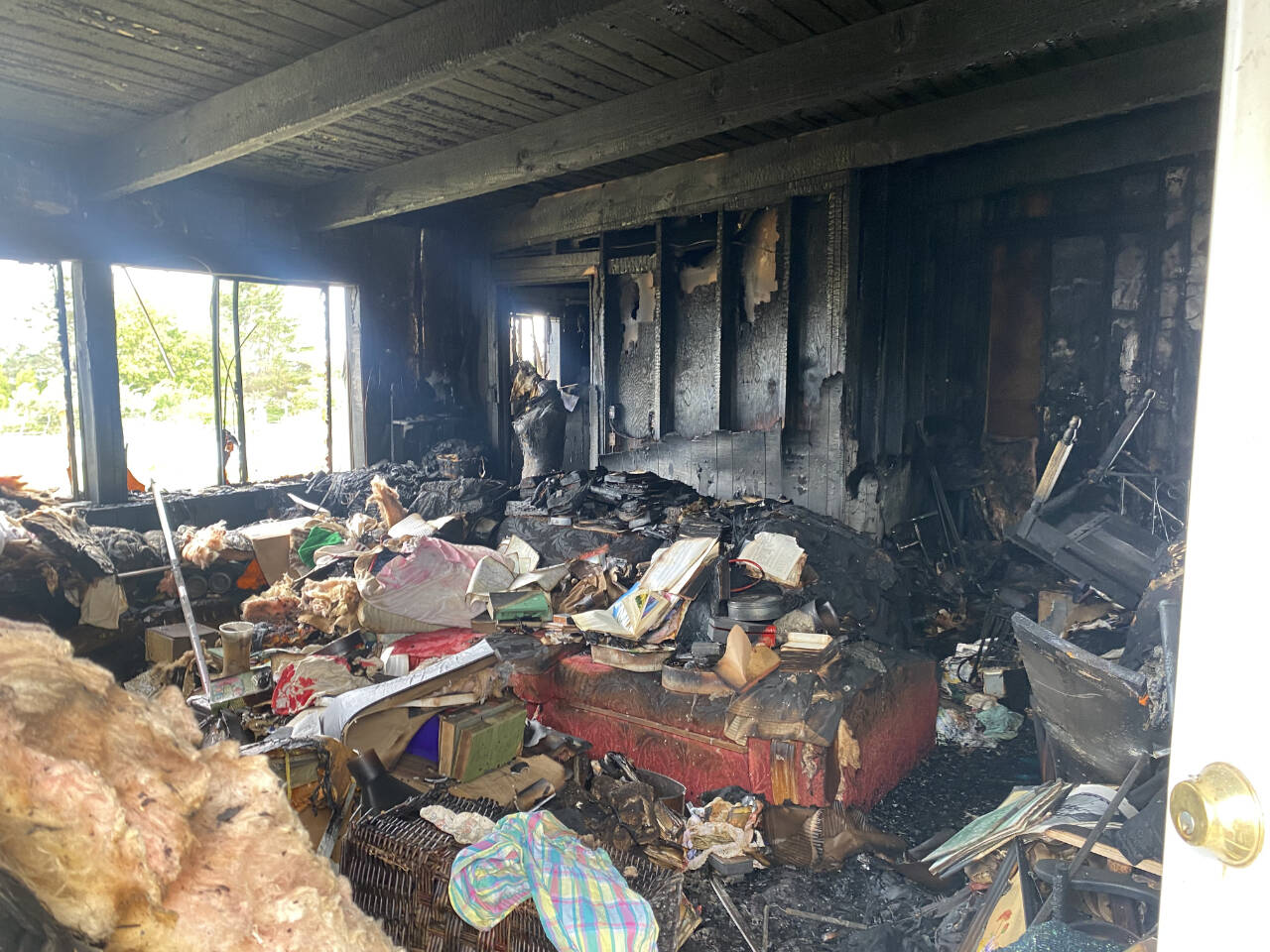 Sequim Gazette photoS by Megan Rogers
Sarah Hurless said that she is overwhelmed and grateful for all of the support from the community after a July 9 fire destroyed much of her parents home.