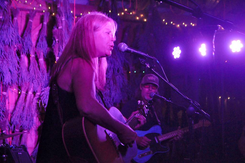 Sequim Gazette photo by Matthew Nash
Kim Trenerry and Jason Mogi perform as part of Joy in Mudville on July 21 at Victors Barn Dance during a packed show.