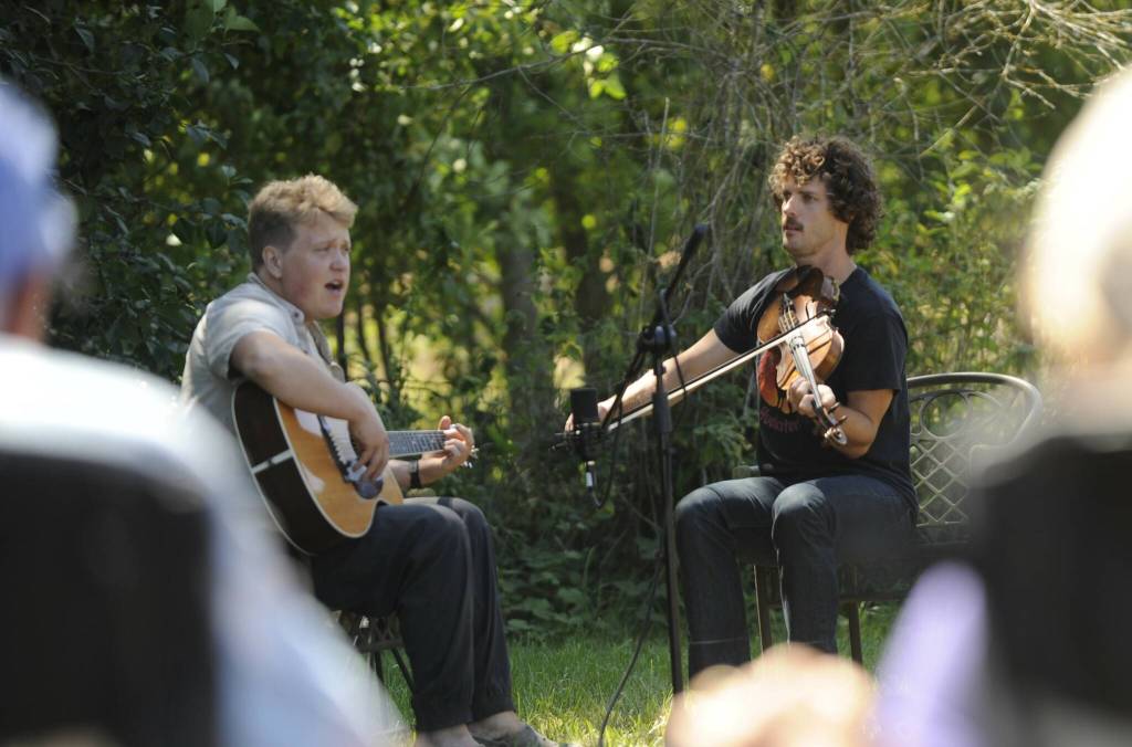 Sequim Gazette photo by Michael Dashiell / Will Jevne, left, and Joey Gish of the Sweater Weather Band offer tunes for visitors at Gnomelicious Lavender Farm on July 22.