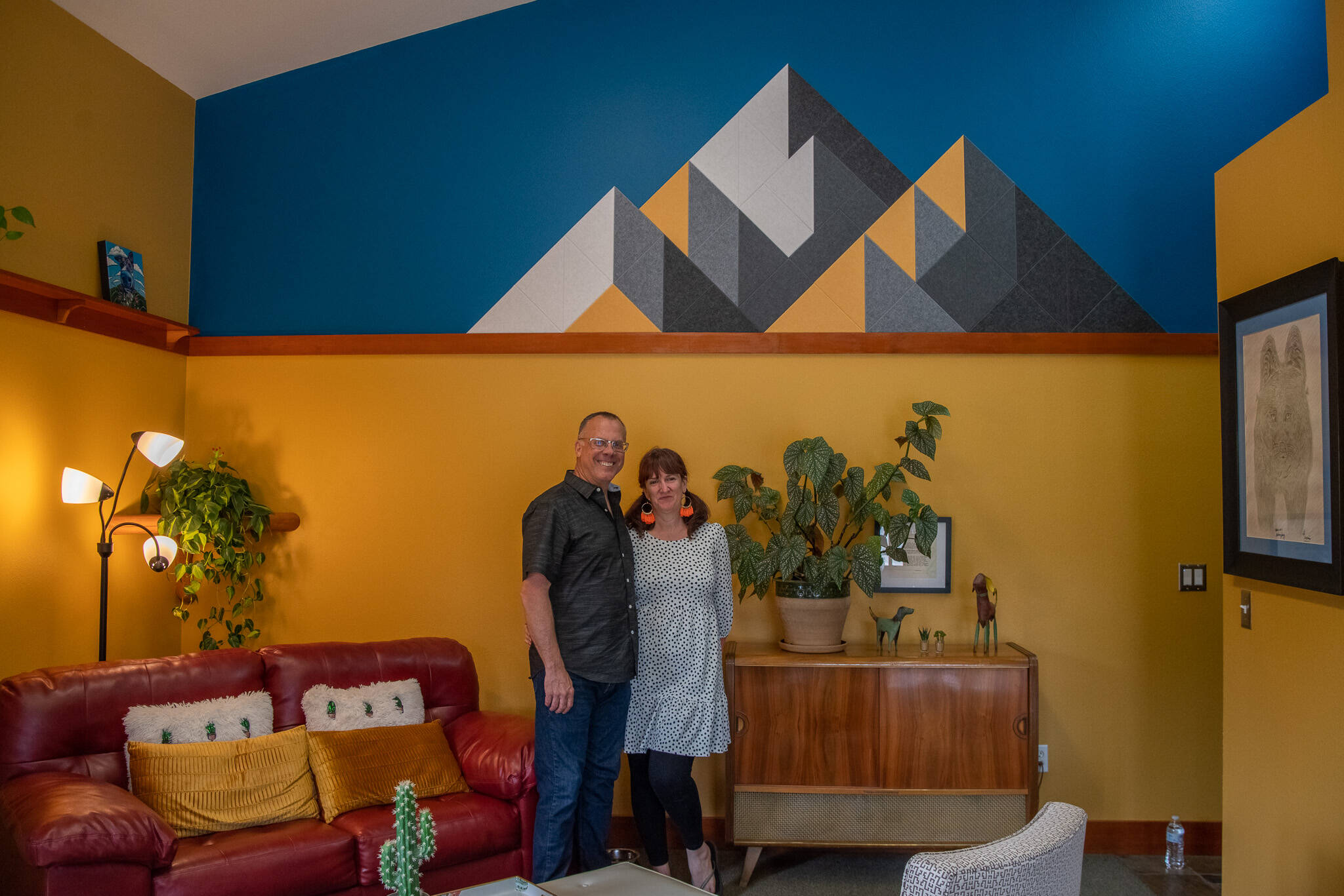 Photo by Emily Matthiessen / Scott Ney and Stephenye Avery, co-owners of MerMutts, pose in the waiting room they painted and redecorated for the Jan. 1st opening. A grand opening will be held in the future.