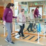 Photo by Emily Matthiessen / Sarah Mattson, physical therapist and clinical manager at Peak Performance Therapy Center in Sequim, guides patient Margo Hewitt through dynamic balance exercises .
