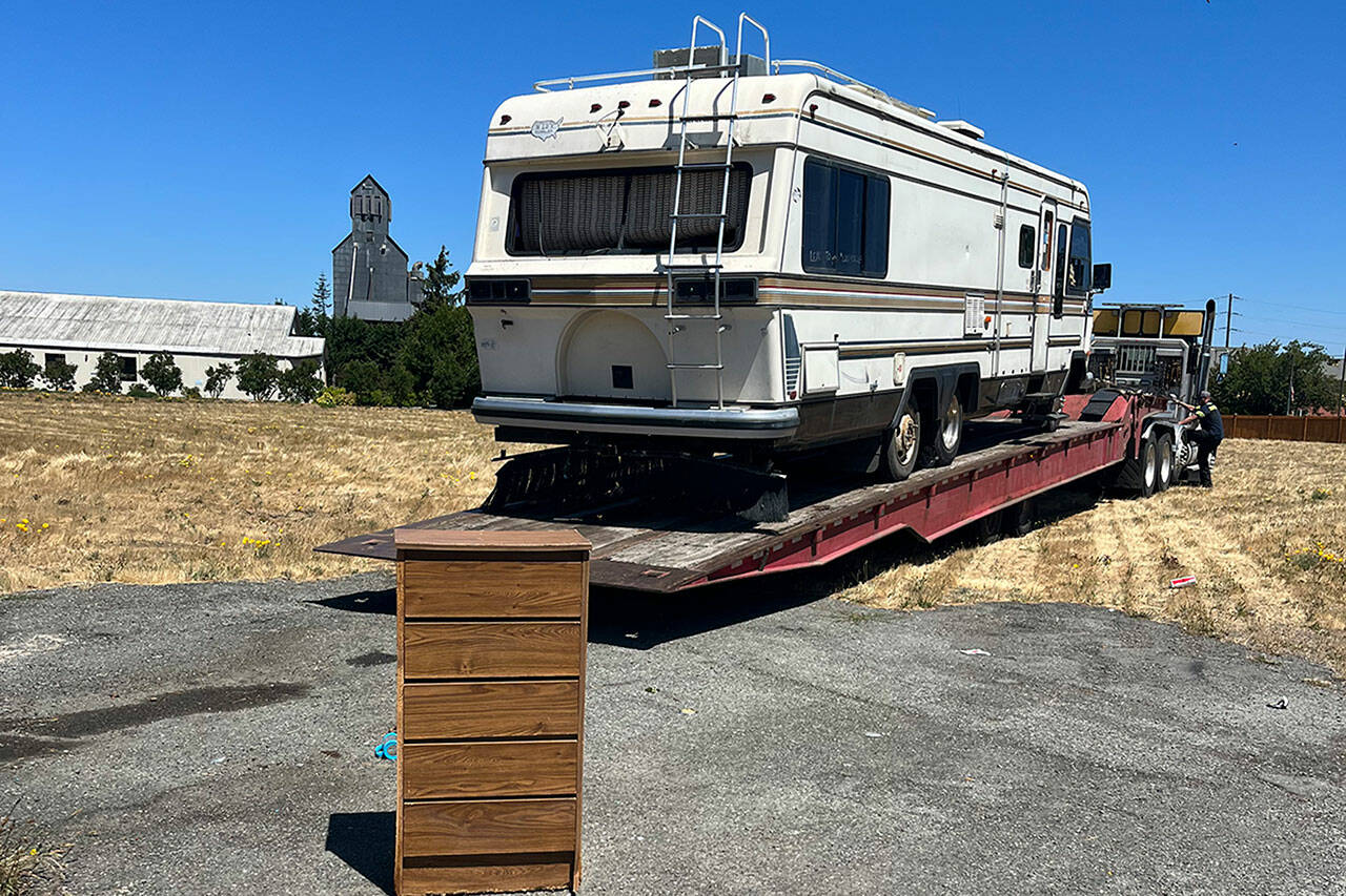Photo courtesy Michelle Ridgway
In mid-July, an RV parked partially on public and private property was towed at the request of the City of Sequim after it was deemed abandoned after 18 months parked in one spot. Its one of a handful of RVs and vehicles illegally parked in the City of Sequim as nonprofit agencies seek safe housing options for residents.