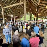 Photo courtesy of Marc Lawrence
More than 100 residents turn out at Elklandia Farm to hear about a proposed gravel pit off Happy Valley Road on July 30.