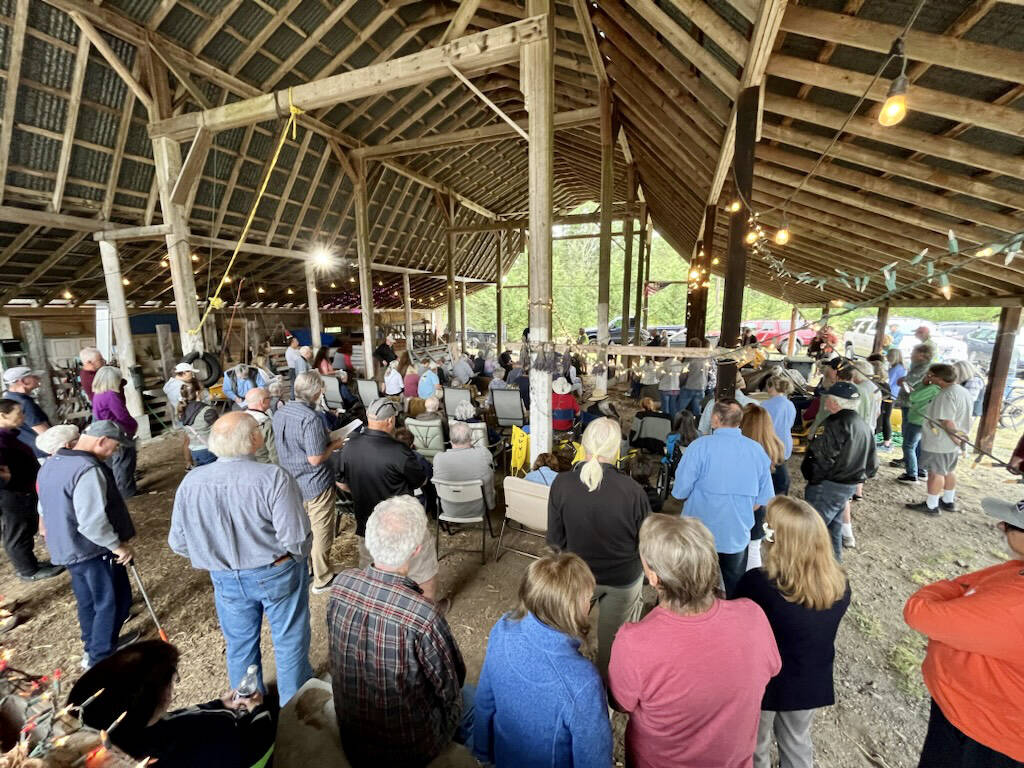 Photo courtesy of Marc Lawrence
More than 100 residents turn out at Elklandia Farm to hear about a proposed gravel pit off Happy Valley Road on July 30.
