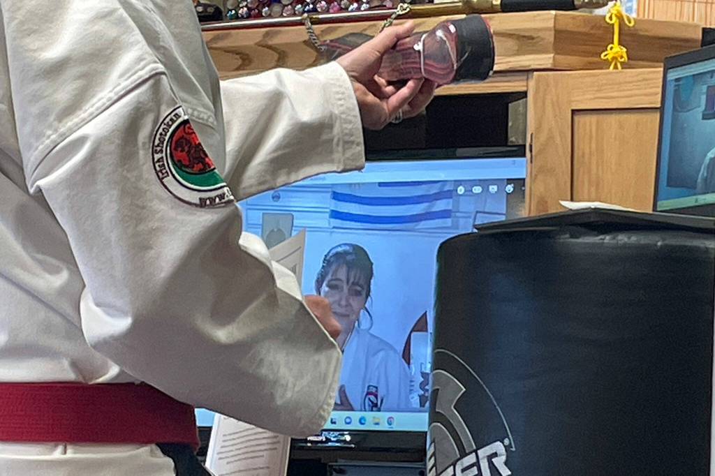 Sequim Gazette photo by Matthew Nash/ Alejandra Vazquez of Uruguay During the Dekimasu Alliances International Seminar in late July at Sequim Martial Arts, alliance founder Hanshi Clay Worley presents