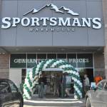 The first customers at Sequims Sportsmans Warehouse enter during its grand opening on the morning of Thursday, Aug. 10.