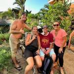 Photo courtesy of Zimmerman family / Eric and Valerye Zimmerman, left, formerly of Sequim, are reunited after running away from wildfires that ravaged Lahaina and much of Maui, Hawaii. Pictured with the Zimmermans are friends Tex, second from right, who fled the fires with Valerye, and Chenome, who is housing the Zimmermans after they lost their home.