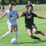 Photo by Rick Ross/Peninsula College / At right, Peninsula Colleges Jaeda Mae Edayan, a freshman forward from Mililani, Hawaii, vies for possession with University of Victorias Sophie Murphy in an Aug. 13 scrimmage in Victoria, B.C.