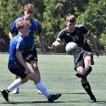 Photo by Rock Ross/Peninsula College
Peninsula Brandon Wagner, right, a Sequim High standout, gets his foot on the ball in a scrimmage against the University of Victoria on Aug. 11.