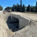 Photo courtesy WSDOT/ Construction crews worked around-the-clock to remove an old culvert and install a new box culvert under U.S. Highway 101 at Eagle Creek between Aug. 13-18.