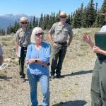 Photo by Paula Hunt/Olympic Peninsula News Group
On a trip to the Olympic National Park last week, Sen. Patty Murray, center, listens to Olympic National Park Superintendent Sula Jacobs, right, explain the ongoing investigation into the cause of the fire that destroyed the Hurricane Ridge Day Lodge on May 7, and the parks efforts to maintain visitor access this summer and possibly into the winter.