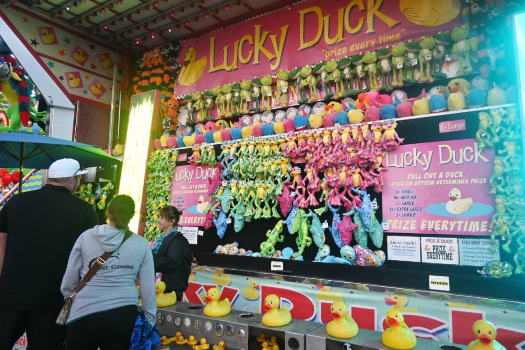 Sequim Gazette photo by Michael Dashiell / Fair-goers enjoy some games at the Clallam County Fair carnival on Aug. 18.