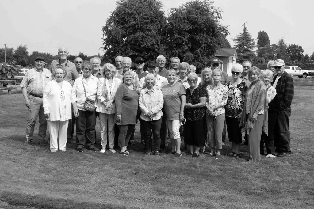 Photo courtesy of Janey Funston/Sequim High School Class of 1963 / Pictured, from left, are Bill Cameron, Len Beil, Elna Hamilton McMasters, Randy Priest, Lance Smith, Donna Petroff Grall, Marilyn Purcell Rinehart, John Carlson, Ron Pease, Minnie Allan Dixon, Bill Alton, Dennis Funston, Janey Olsen Funston, Eric Hendrickson, Penni Schindler Maples, Jim Hope, Judy Sherk Bromell, Gleynda Matriotti Brownfield, Lila Roup Petroff, Mike Pease, Suzie Bilow Oscarson, Bonnie Wilber Eisenbeize, Jerry Brownfield, Marilyn Holmberg Gates, Jerri Gowdy, Jim Easterly and Bill Gowdy.