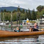 Photo by Mary and Kip Tulin
Robbie Niclas and grandson William, 5, both of Sequim, use a canoe Niclas built in the 5-kilometer course for rowers and paddlers as part of Reach and Row for Hospice in 2022.