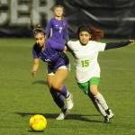 Sequim Gazette file photo by Michael Dashiell / Sequims Jennyfer Gomez, left, battles with a Clover Park midfielder in the Wolves 2-0 win in the West Central District tourney opener in 2022.