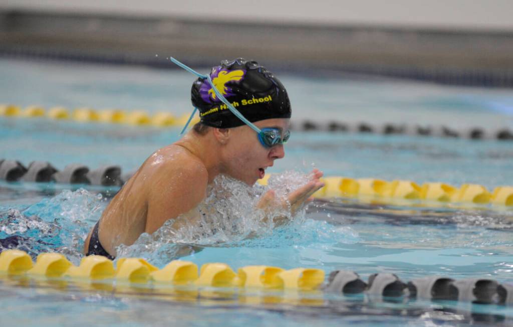 Sequim Gazette photo by Michael Dashiell / Sequims Annie Ellefson races to a win in the 100 breaststroke as the Wolves host East Jefferson on Sept. 13.